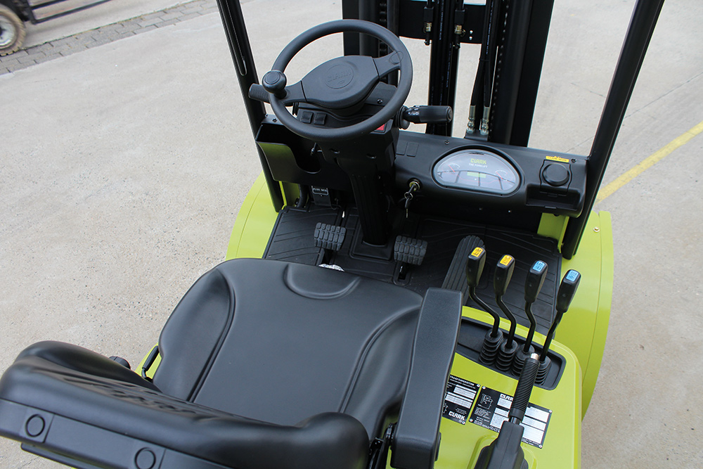 Ergonomic driving position with hood mounted levers