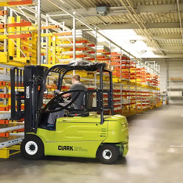 A Clark electric forklift truck from the GEX series picks the doors for dispa